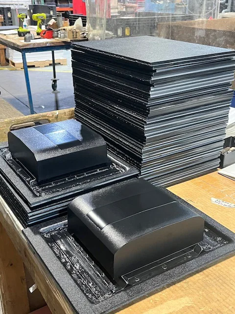 Black thermoformed industrial components and sheet stock