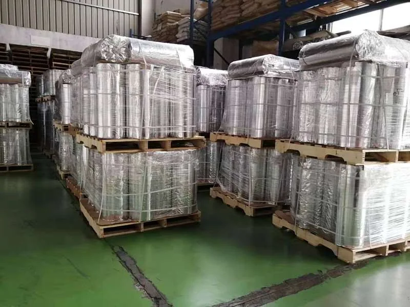Wrapped plastic material rolls stored on export pallets